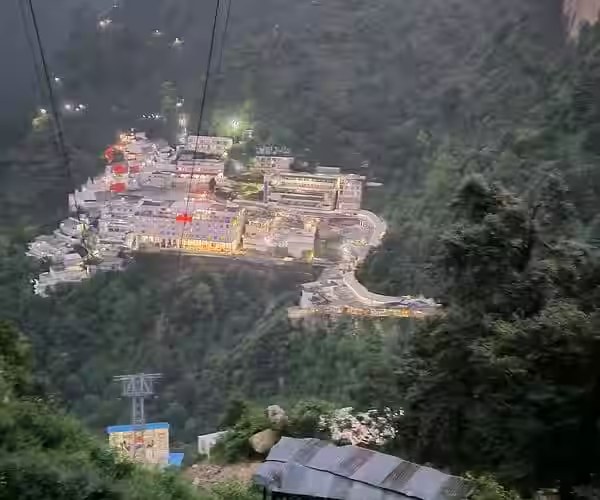 Shri Mata Vaishno Devi Bhawan seen from the ropeway at dusk